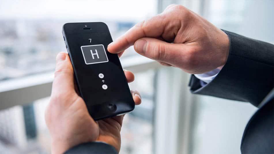 img_Solutions for new buildings_Kone remote call closeup hands